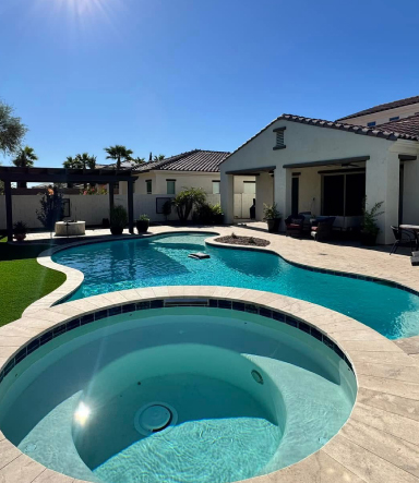 Inground freeform pool with built-in spa in Arizona
