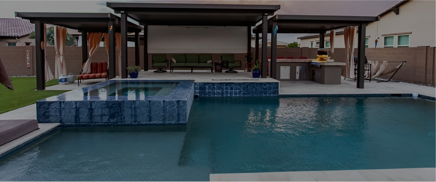 geometric swimming pool and spa design with outdoor kitchen and pergolas in Arizona